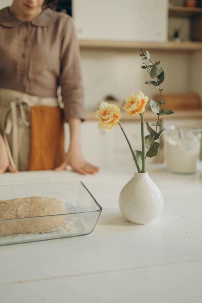 Soft linen kitchen with natural light and simple homemaking rhythms